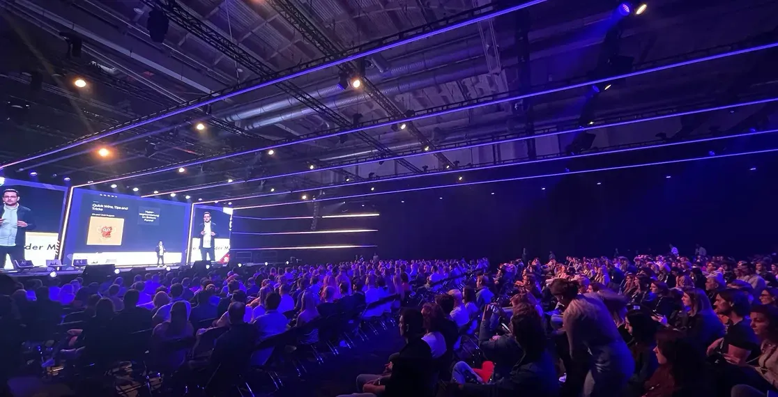 Denys Lichtenstein speaking on the OMR stage in front of around 10,000 attendees about Feed Hacking and data-driven scaling